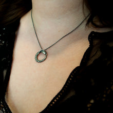 Load image into Gallery viewer, Ouroboros snake necklace, on a woman&#39;s neck.