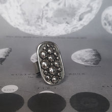 Load image into Gallery viewer, Rustic statement silver ring with balls on an oval shape.